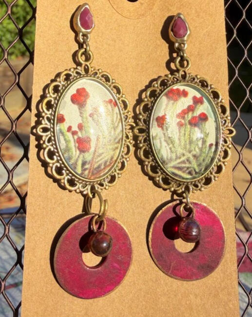 Red Crest Lichen. Brass studs w/ metal & bead accents. Approx 3" drop. $25