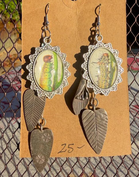 Rough Prominent Larva & Red Humped Larva. Silver fish hook earrings w/ antique silver dangling accents. Approx 3" drop. $25